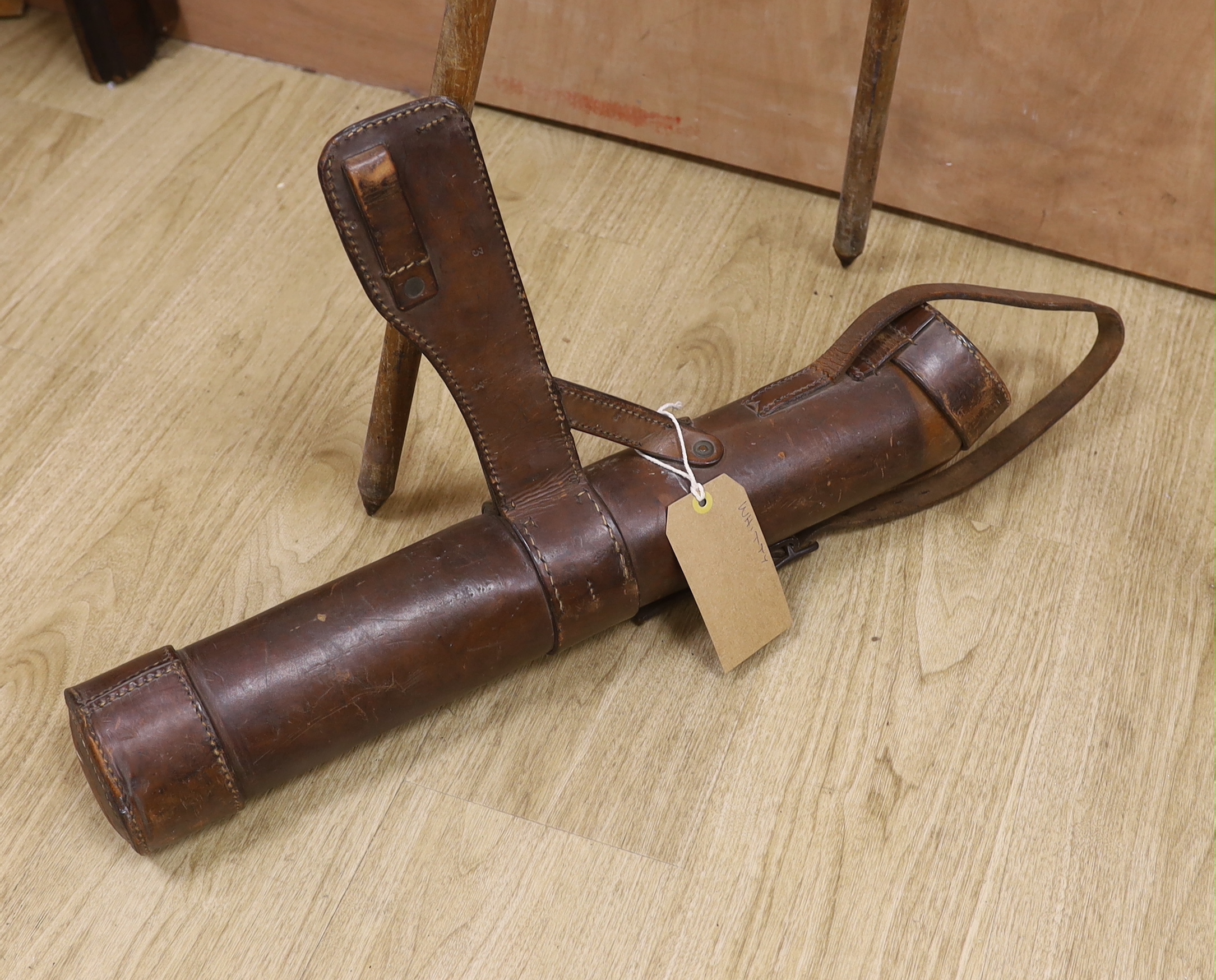 A WWI leather cased telescope and tripod, 57cm